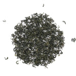 A pile of loose, dried Emei Maofeng Green Tea leaves from My Store is displayed on a white background.