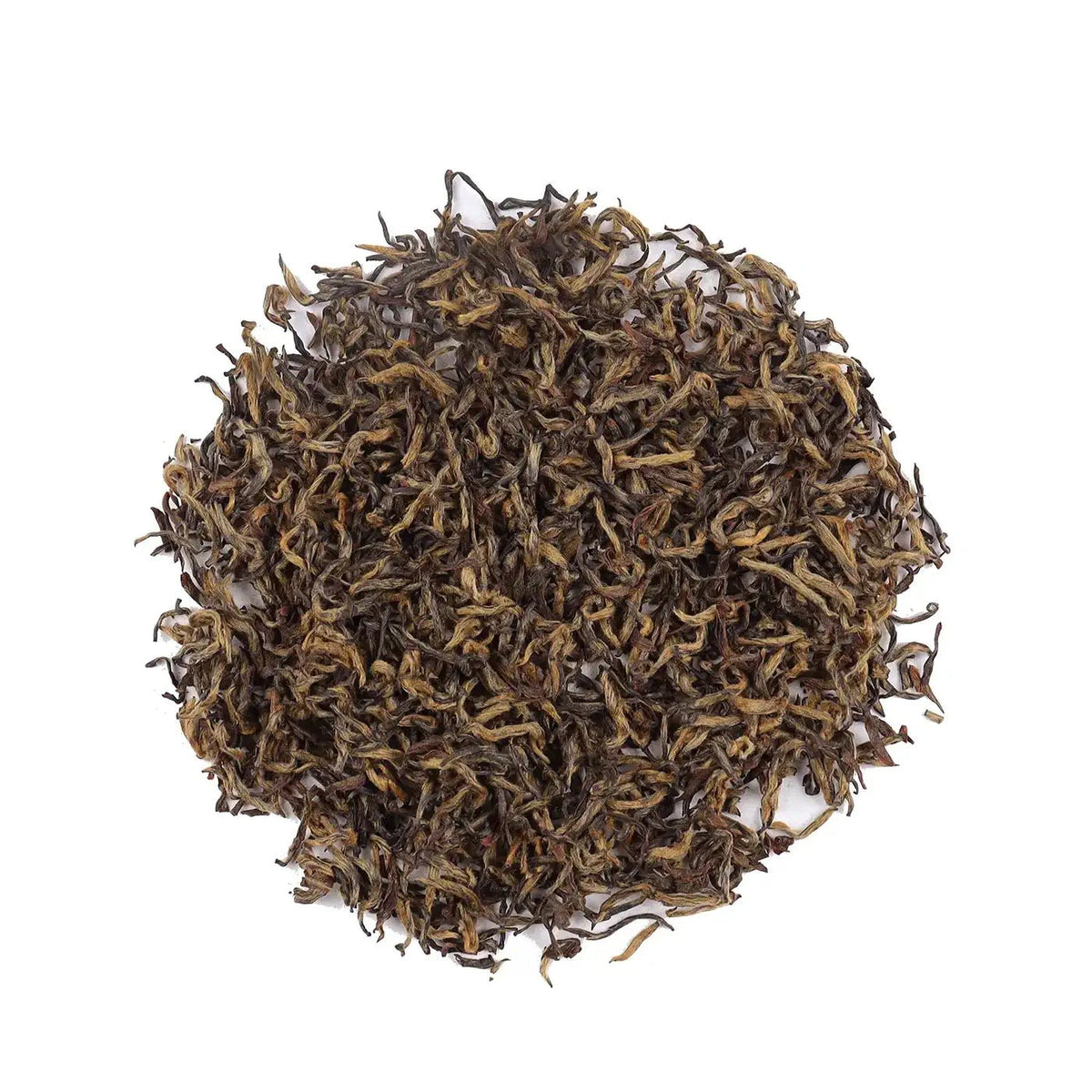 Jin Jun Mei Black Tea dry leaves arranged in a round pile on a white background.