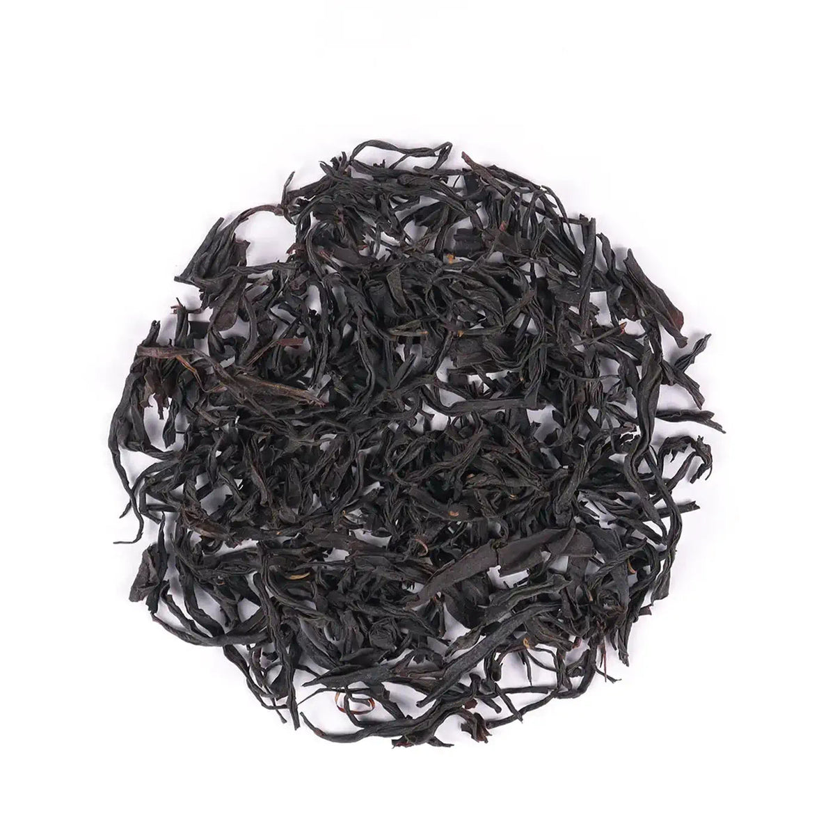 Lapsang Souchong Black Tea loose leaf tea arranged on a white background.