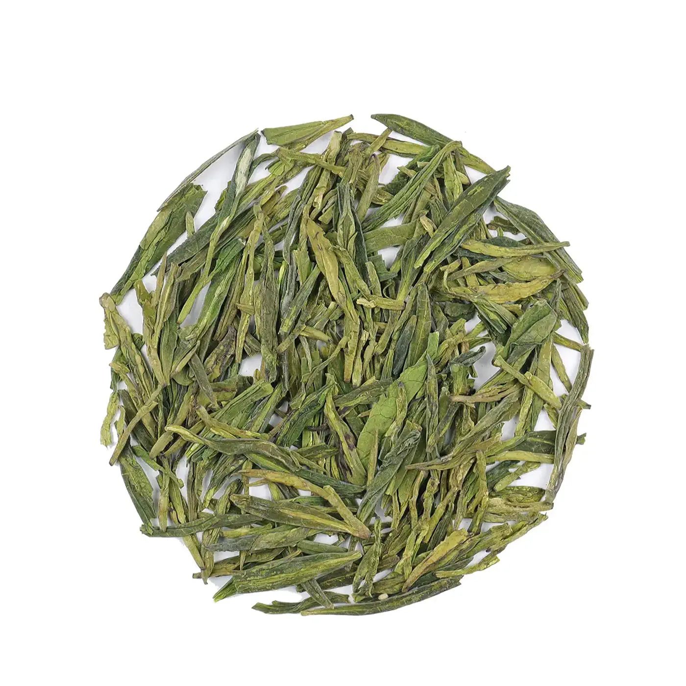 My Store’s Longjing Dragon Well Green Tea leaves are arranged in a circle on a white background, showcasing their distinctive chestnut aroma.