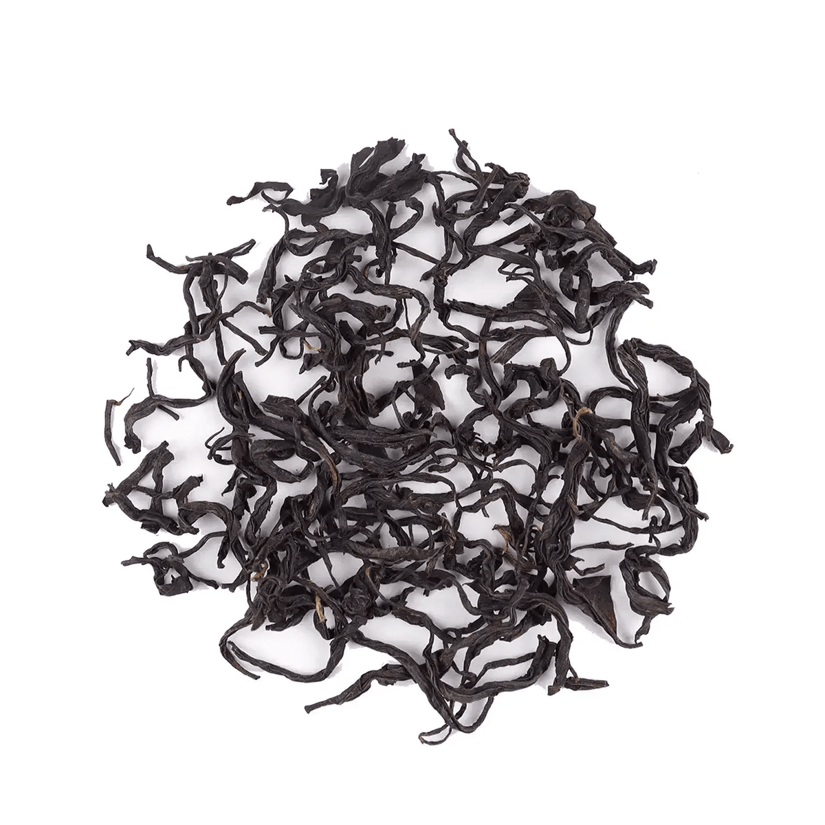 Oriental Beauty Oolong Tea dry leaves arranged in a round pile on a white background.