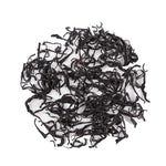 Phoenix Dancong Oolong Tea by My Store is displayed as loose leaves on a white background, evoking a subtle floral aroma.