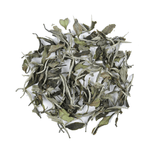 My Store’s White Peony Tea loose leaves are artfully arranged in a circular pile on a white background.